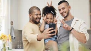 LGBTQ+ Family taking a selfie.