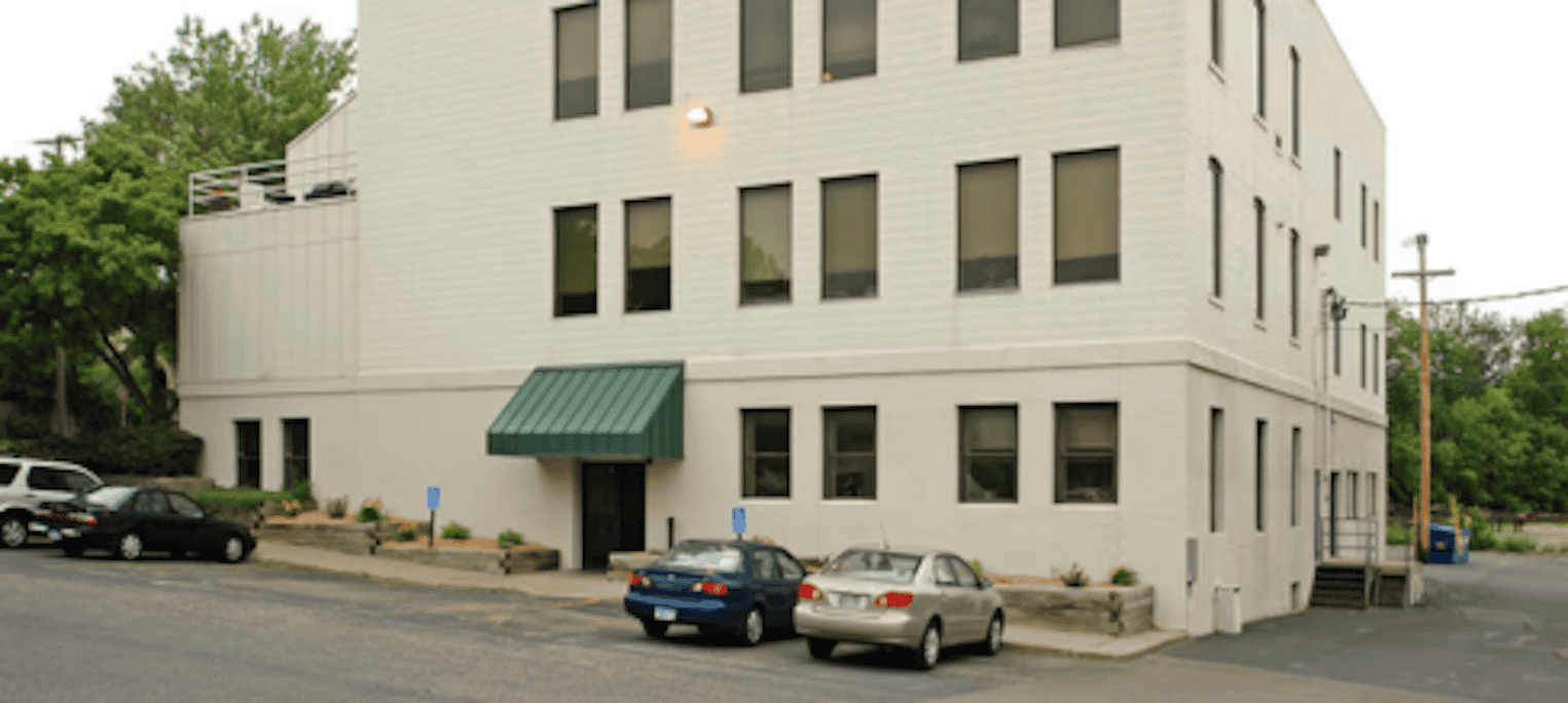 2 And old photo of the outside of an office building